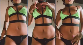 Lívia Vitória, a brasileira, dando aquele charuto enquanto se apresenta no palco do strip