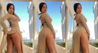 Eimigirl de vestidinho provocante exibindo o bumbum