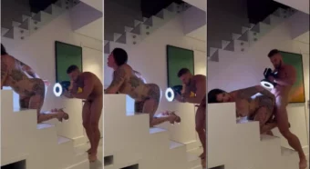 Anny Alves, a brasileira cheia de atitude, fazendo um carinho no bonito na escada