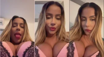 Anitta safadinha e quente, mordendo os lábios e exibindo a língua