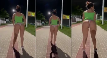 Morena sexy gravando um vídeo de vestido